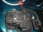 Squeeze the prongs on the plug together and pull out the plug.